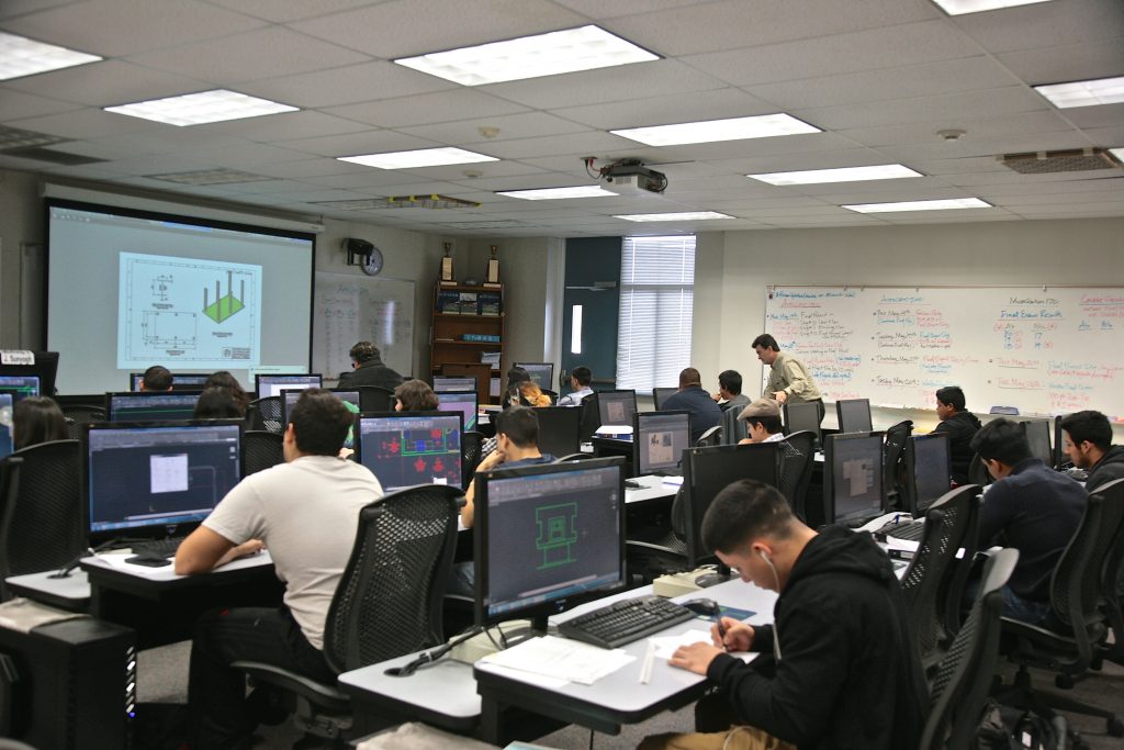 ACEG instructor and students in classroom