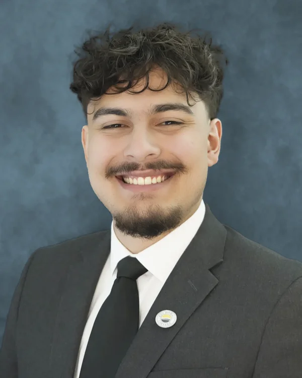 student trustee Carlo Flores-Olson