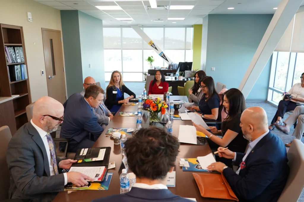 Río Hondo Community College District Board of Trustees, Superintendent/President Teresa Dreyfuss, Board of Trustee President Lomeli, Vice President Rocha, Board member Valladares, and senior administrators meet with Director of Workforce Initiatives Troy Selberg and Western Regional Representative Joshua Wetzel