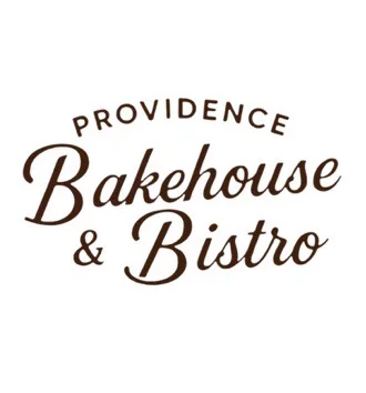 Logo with the words "Providence Bakehouse & Bistro" in a brown, cursive font on a white background.