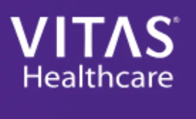 VITAS Healthcare logo with white text on a purple background.